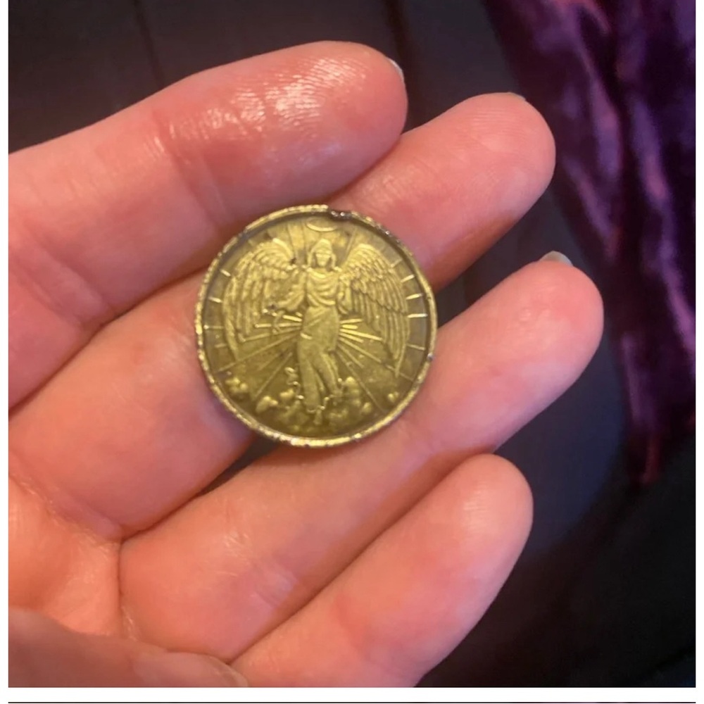 Double sided guardian angel coin